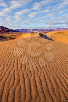 Bright sunny morning in a picturesque part of Death Valley. Thin waves on the sand. Mesquite Flat Sand Dunes