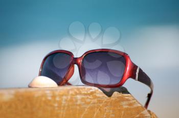 Sunglasses by the ocean