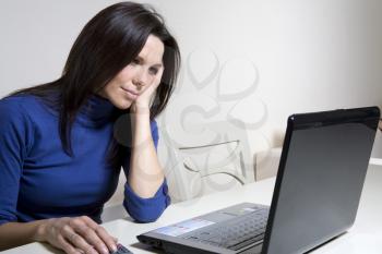 Royalty Free Photo of a Woman Paying Her Bills Online