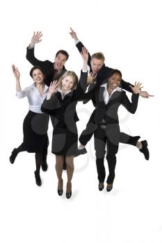 Royalty Free Photo of a Multi-Racial, Multi-Gender Group of Businesspeople Leaping