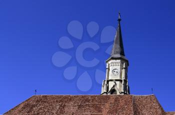 Old church roof with clock tower