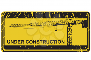 Under construction stamp with crane silhouette