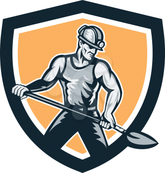 Illustration of a coal miner with hardhat on holding shovel set inside shield crest on isolated backgorund done in retro style.