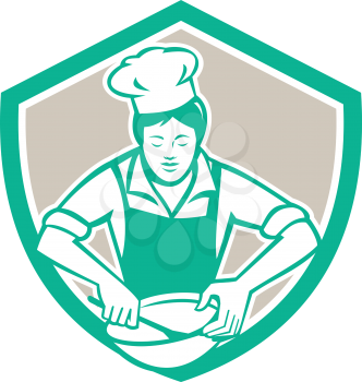 Illustration of a female chef with hat holding spatula and mixing bowl mixing viewed from the front set inside shield crest on isolated background done in retro style. 