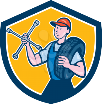 Illustration of a tireman mechanic holding tire wrench and tire on shoulder set inside shield crest on isolated background done in cartoon style.