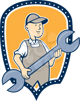 Illustration of a mechanic holding spanner wrench facing front set inside shield crest on isolated background done in cartoon style.