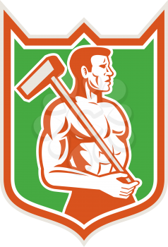 Illustration of a union worker holding sledgehammer hammer on shoulder done in retro style set inside shield crest on isolated background.