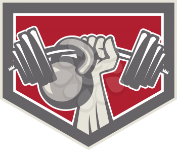 Illustration of a hand lifting weights barbell kettlebell viewed from front set inside shield crest on isolated background done in retro style.