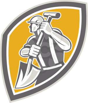 Illustration of a construction worker wearing hardhat digging using shovel spade facing side set inside shield done in retro style
