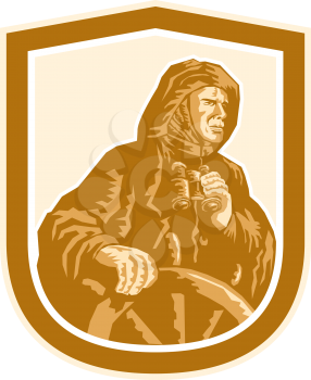Illustration of a fisherman sea captain with binoculars at the wheel helm set inside shield crest done in retro style on isolated white background. 
