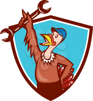 Illustration of a wild turkey mechanic holding spanner set inside shield crest done in cartoon style on isolated background.