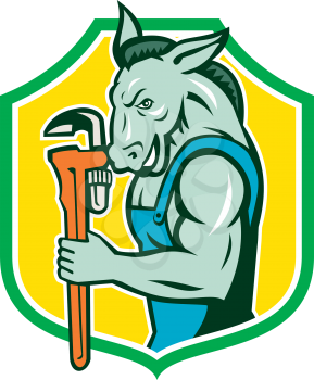 Illustration of a donkey plumber mascot holding monkey wrench viewed from the side set inside shield crest done in retro style. 