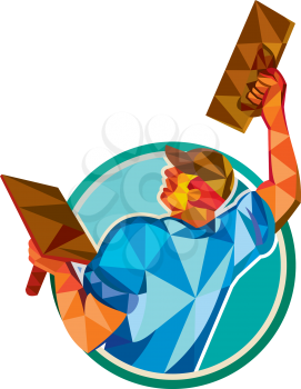 Low polygon style illustration of a plasterer masonry tradesman construction worker raising up trowel over head viewed from the back set inside circle done on isolated background