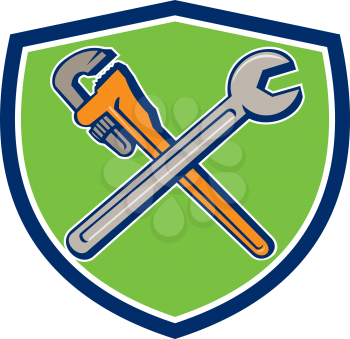 Illustration of a plumber's monkey wrench and mechanic's spanner crossed set inside crest shield on isolated background done in cartoon style. 