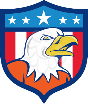 Illustration of an american bald eagle head angry looking to the side set inside shield crest with usa flag stars and stripes in the background done in cartoon style. 