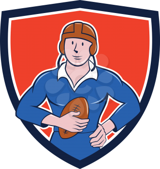 Illustration of a vintage French rugby player holding ball facing front set inside crest shield done in cartoon style.