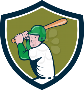 Illustration of an american baseball player ready to bat set inside shield crest on isolated background done in cartoon style.