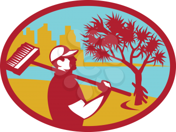 Illustration of a cleaner wearing hat holding broom on shoulder viewed from the side with pandanus tree and building and coast in the background set inside oval shape done in retro style. 