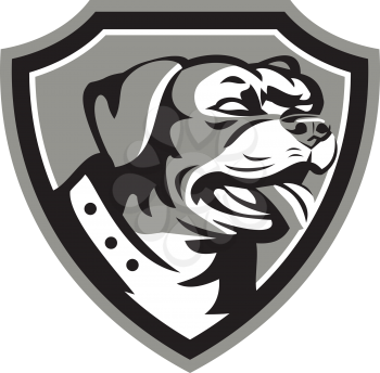 Black and white illustration of a Rottweiler Metzgerhund mastiff-dog guard dog head looking to the side set inside crest done in retro style. 