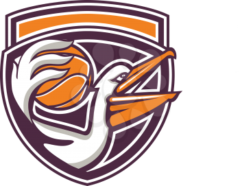 Illustration of a pelican holding passing basketball ball viewed from the side set inside shield crest on isolated background done in retro style. 