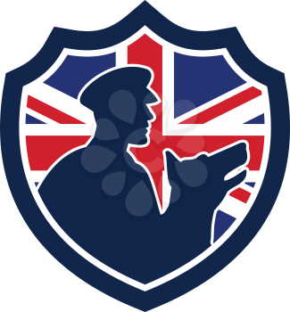 Icon retro style illustration of a British police canine team showing a policeman and police dog silhouette with United Kingdom UK, Great Britain Union Jack flag set inside circle isolated background.