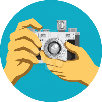 Retro style illustration of a pair of hands holding a retro vintage 35mm film camera clicking taking a photo front view on isolated background.
