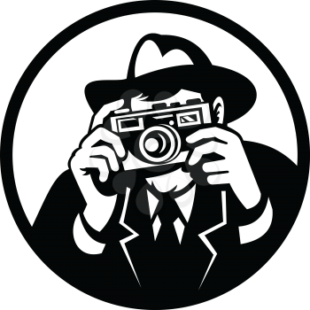 Retro style illustration of a photographer wearing fedora hat a shooting vintage camera viewed from front on isolated background in black and white.