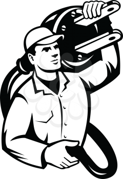 Black and White Illustration of an electrician, power lineman or construction worker carrying an electric plug viewed from front done in retro style on isolated white background.