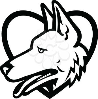 Black and white mascot illustration of head of a German Shepherd or Alsatian wolf dog set inside heart shape viewed from side on isolated background in retro style.