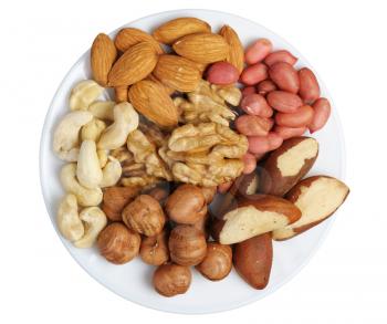 Peanuts, cashews, almonds, walnuts, Brazil nuts and hazelnuts on a white background, isolated