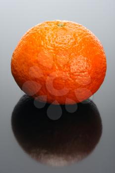Royalty Free Photo of an Orange on Black