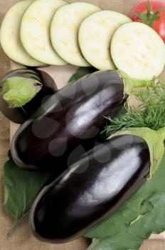 Royalty Free Photo of Eggplants and Slices