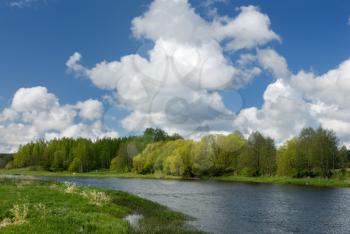 Royalty Free Photo of a River Scene With Clouds in the Sky