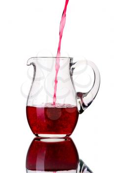 Glass pitcher, isolated on a white background.