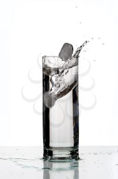 Glass with a water, isolated on a white background.