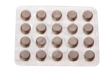 Pills in a blister pack on a white background, isolated