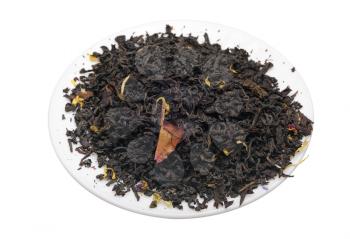 Black tea with flower petals and spices on a white background.