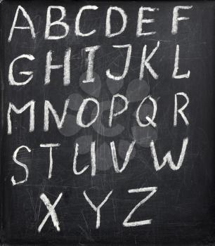 Alphabet on blackboard for writing with chalk 