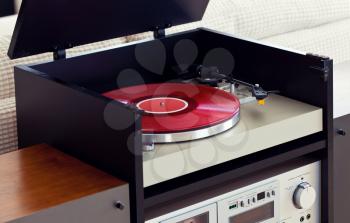 Stereo Audio Music Turntable Vinyl Record Player in Rack Closeup