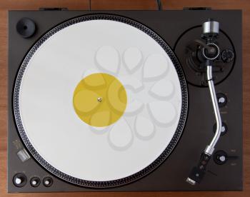 Vintage Record Turntable Player With White Vinyl Disk Top View