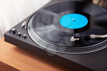 Vintage Record Turntable Plays Black Vinyl Disk Angled View