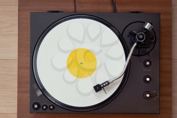 Vintage Record Turntable Plays White Vinyl Disk Top View