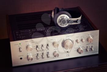 Vintage Audio Stereo Amplifier with Headphones Side View