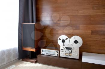 Vintage audio system in minimalistic modern interior, diagonal perspective view