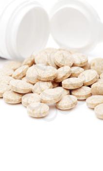 heap of pills isolated on the white background