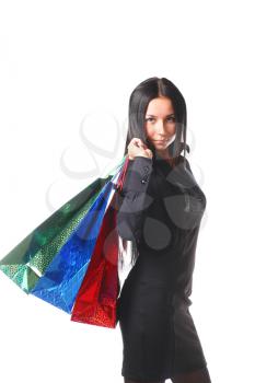 Happy shopping woman with bags- isolated over white