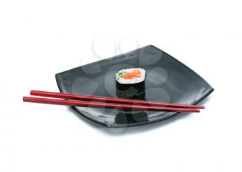 fresh sushi, shot in natural light on black plate