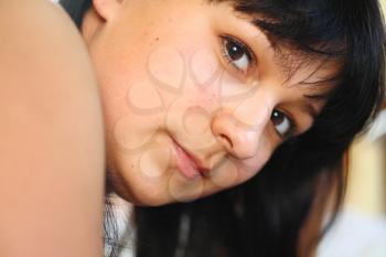 Beautiful Woman with Dark Hair and Eyes Close Up