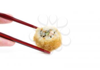 chopsticks holding sushi against pure white background