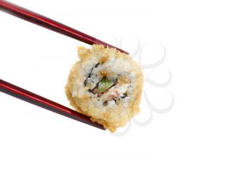 chopsticks holding sushi against pure white background